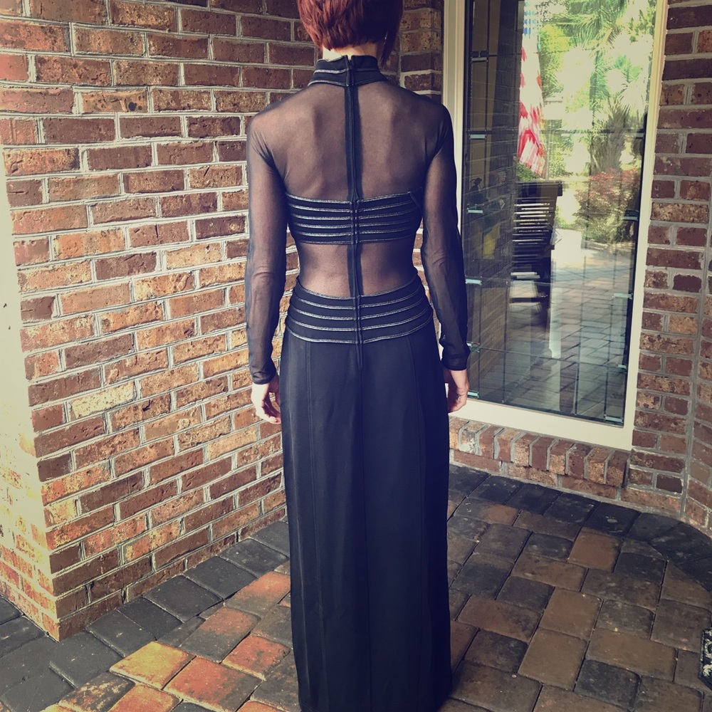 Black evening down with silver and sheer cuts